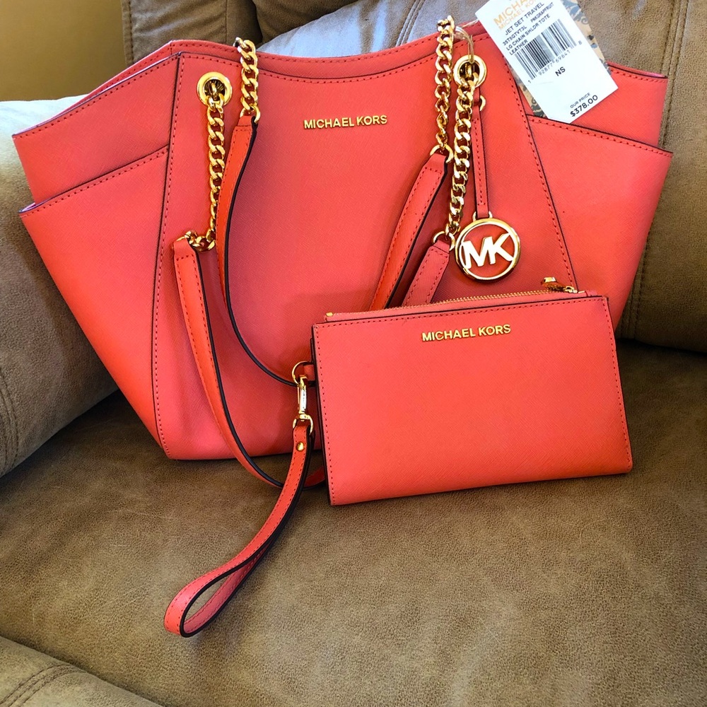 Michael Kors “Pink Grapefruit” handbag & wallet set.